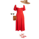 a red dress styled with red shoes, hat and a purse