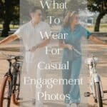 A couple walking and holding bikes side by side, the woman wearing a blue denim jumpsuit and sneakers while the man wears white pants and a white collared tee with black sneakers with txt overlay "what to wear for casual engagement photos"