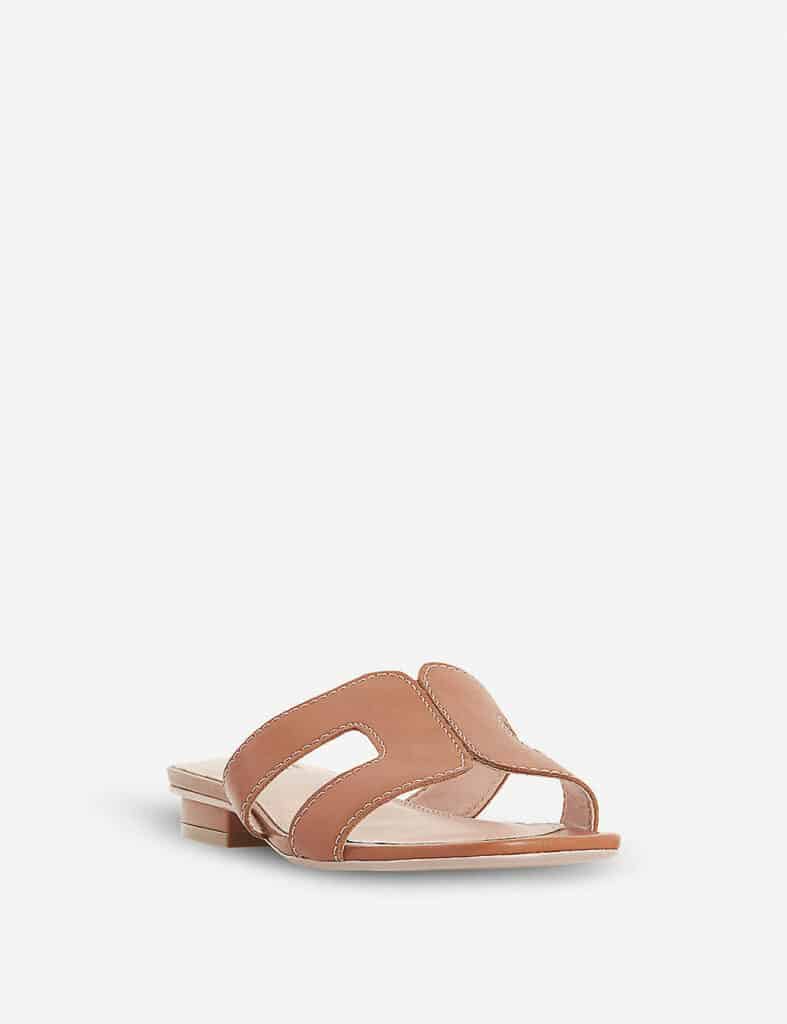 image of a pair of brown leather sandals with a cut-out shape on the top