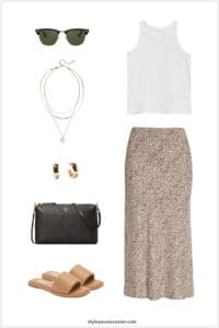 image of a style moos board with a leopard midi skirt, white tank top, brown sandals, black purse, and gold jewelry