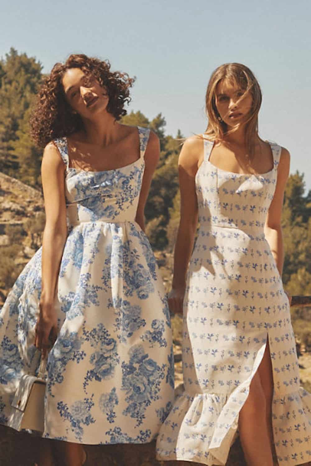image of two women wearing blue and white floral dresses
