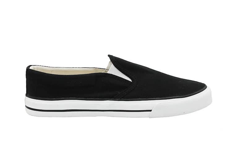 image of womens black canvas slip on shoes with a white sole