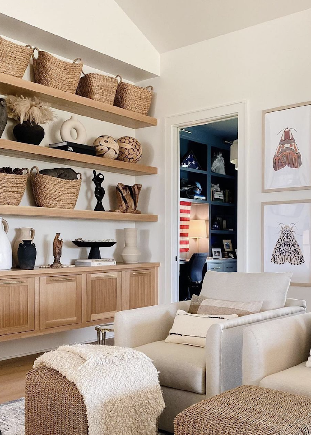 image of a shelf system in a light and airy living room styles with basket decor