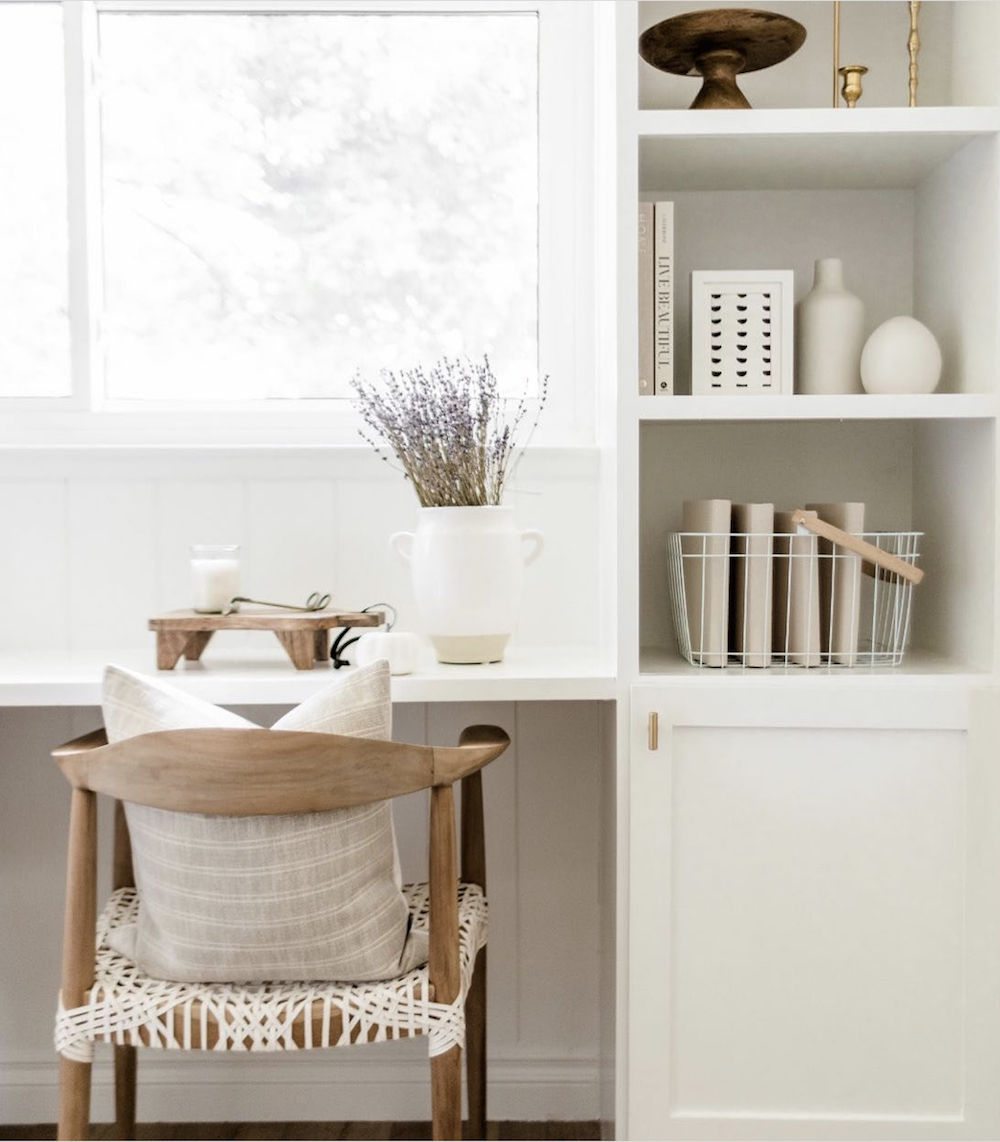 image of a neutral white office with natural wood accents and white calming decor
