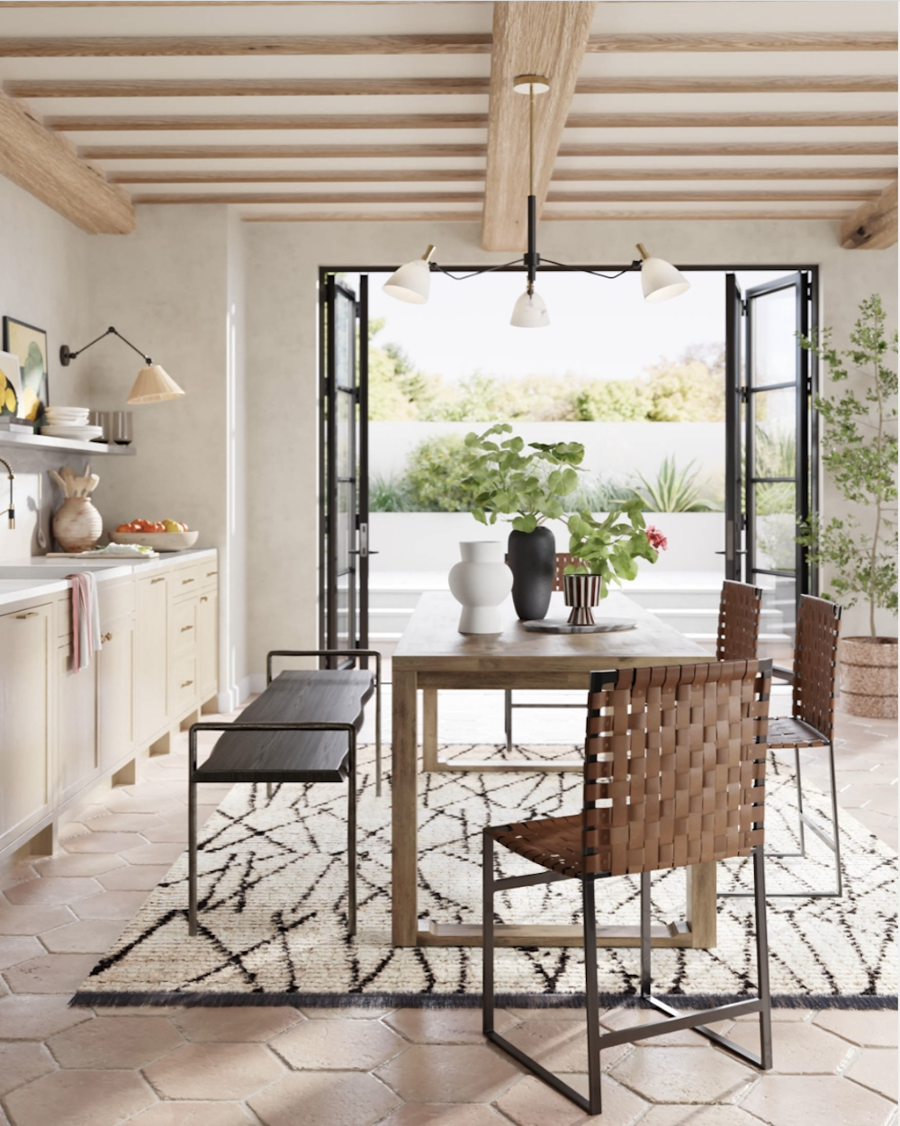 image of a dining room with a large door to the outside with modern, earthy decor