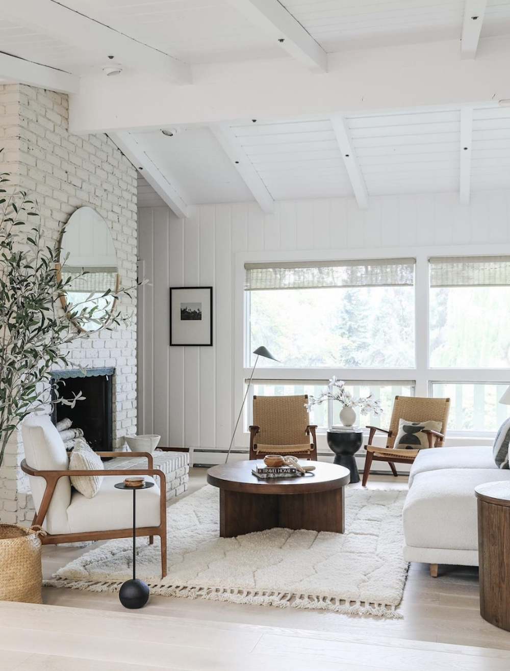 image of a white and airy living room with mid century modern style furnishings