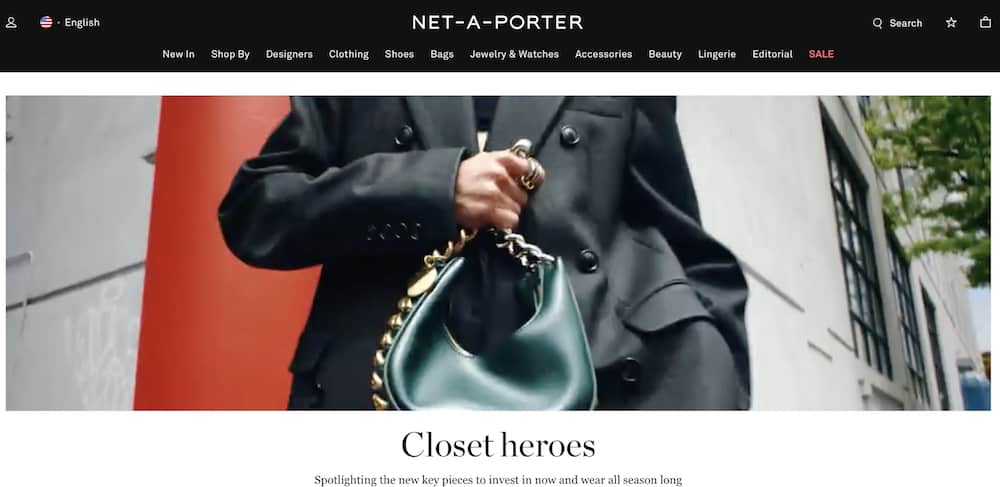 image of the front landing page of the Net-a-porter site with a woman holding a green purse