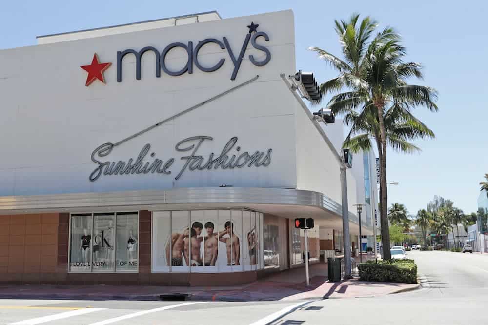 image of a Macy's storefront with a palm tree 