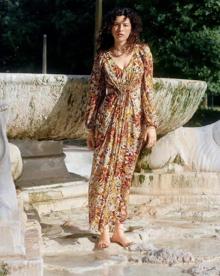 Woman wearing a printed maxi dress.