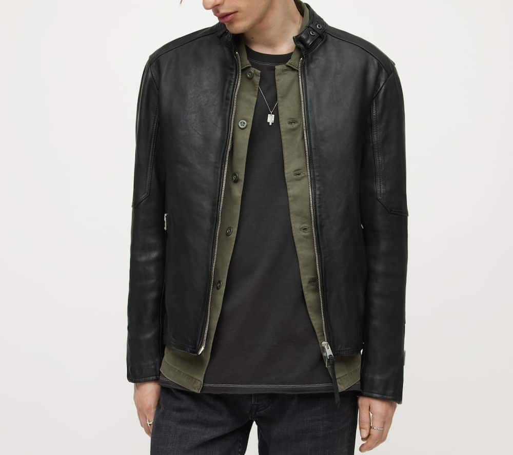image of a man wearing a leather jacket over a charcoal t-shirt