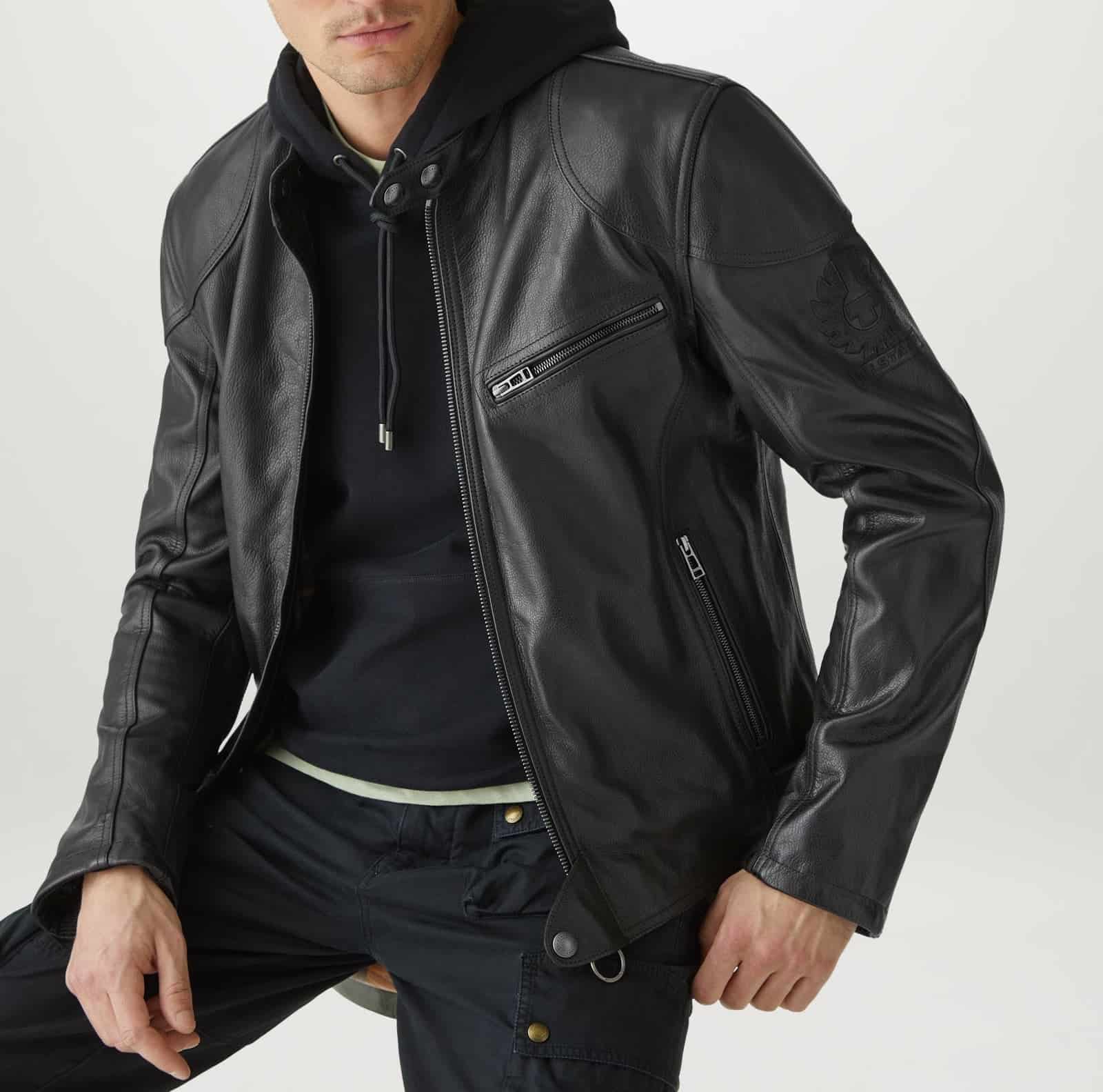image of a man wearing a black leather jacket over a black hoodie