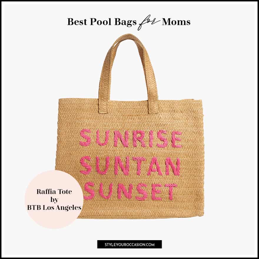 image of a woven raffia beach bag with pink embroidered writing on it