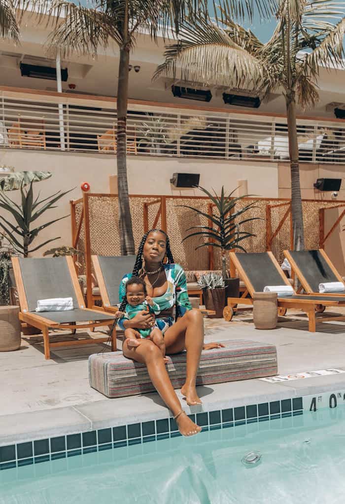 image of a black mom and her baby at the pool