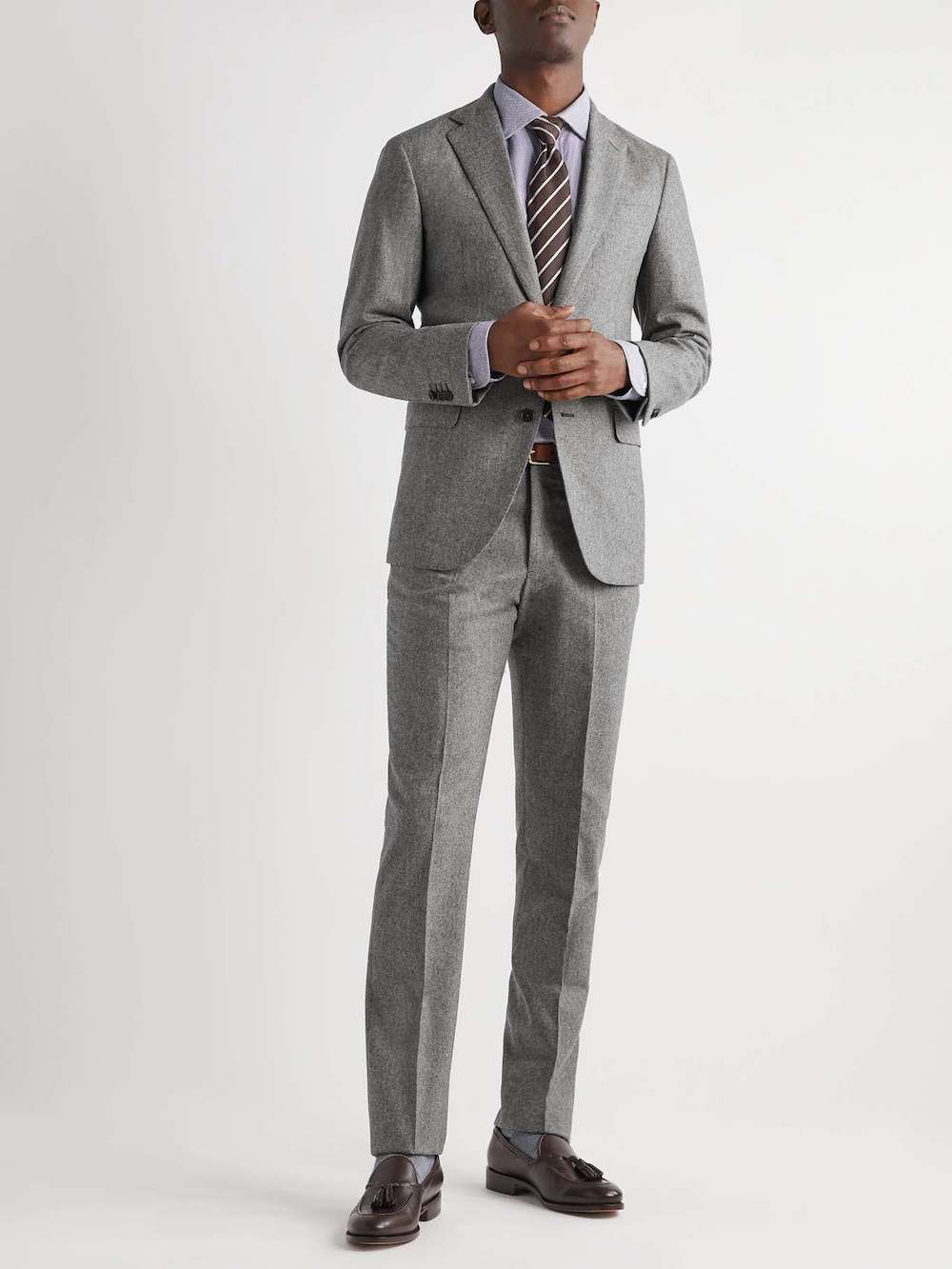 image of a man wearing a grey suit and brown dress shoes