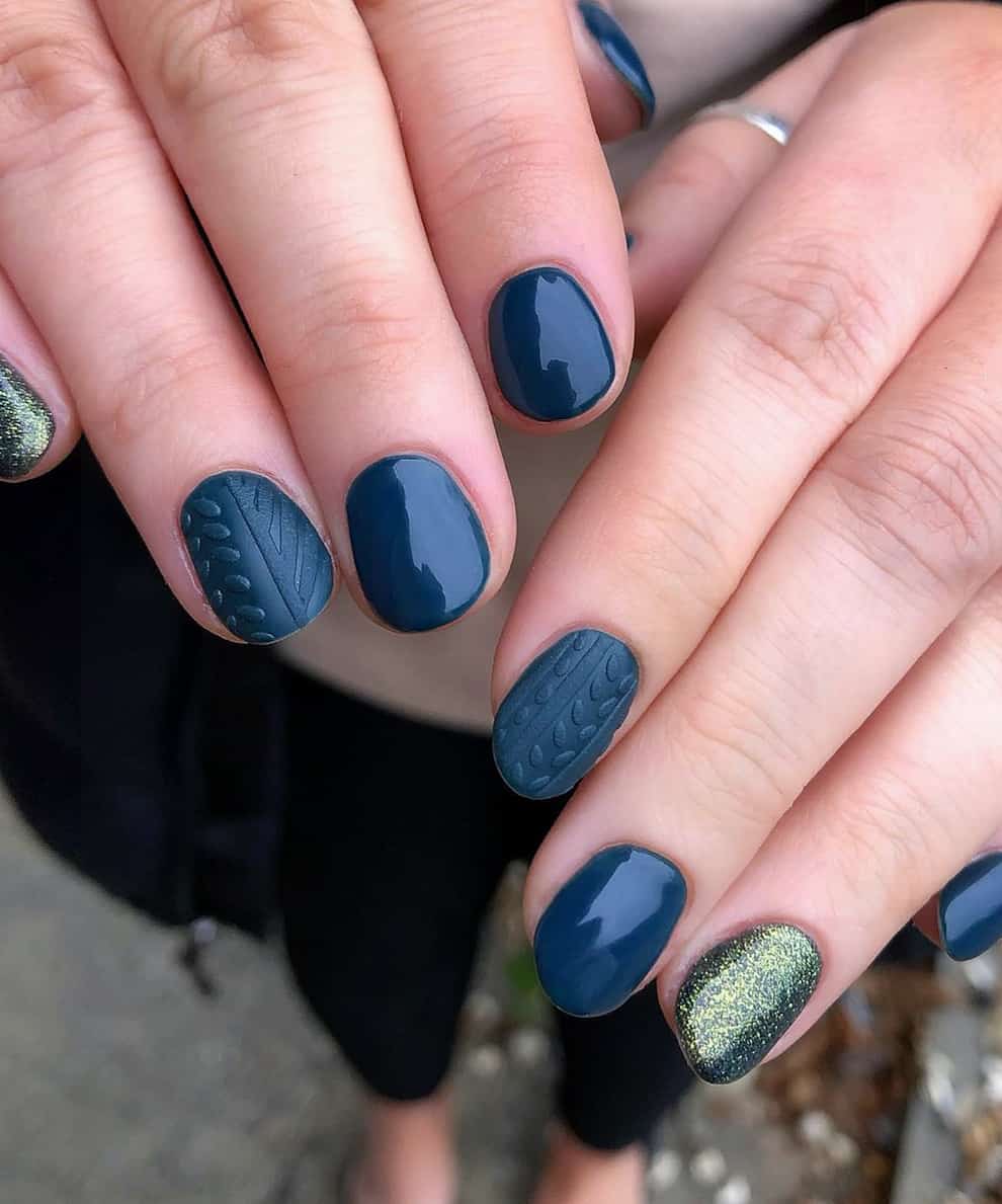 hands with dark navy nails