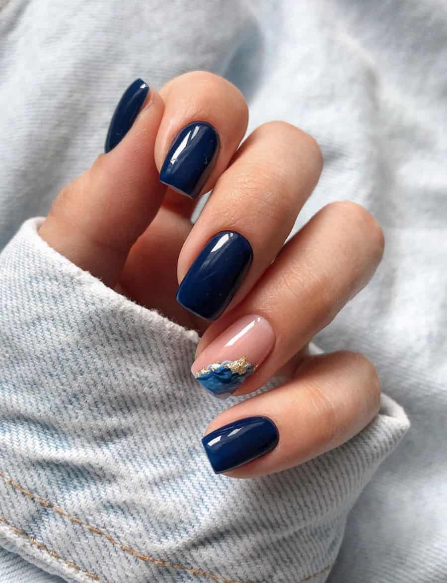 hand with dark blue nails