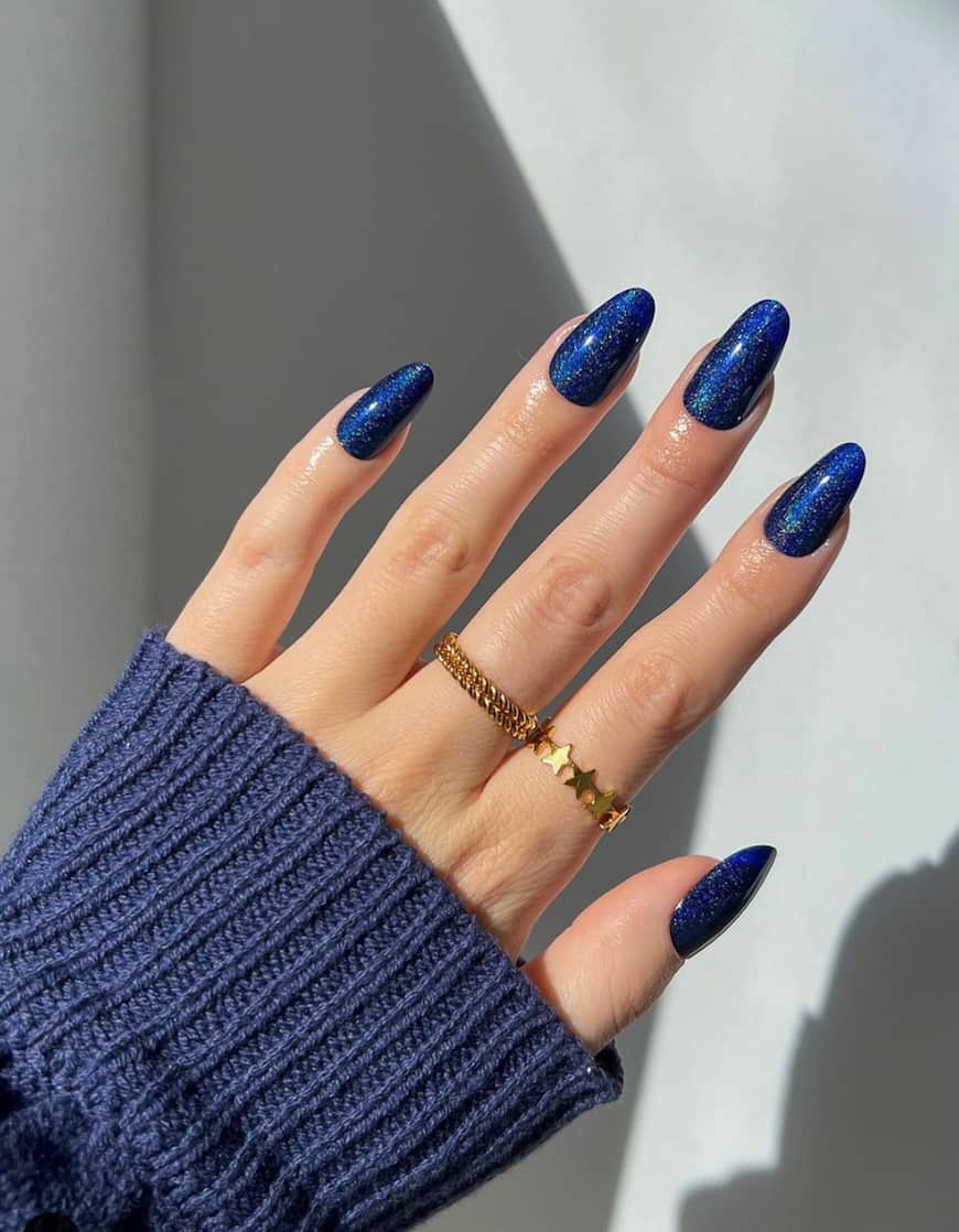 hand with simple blue polished nails