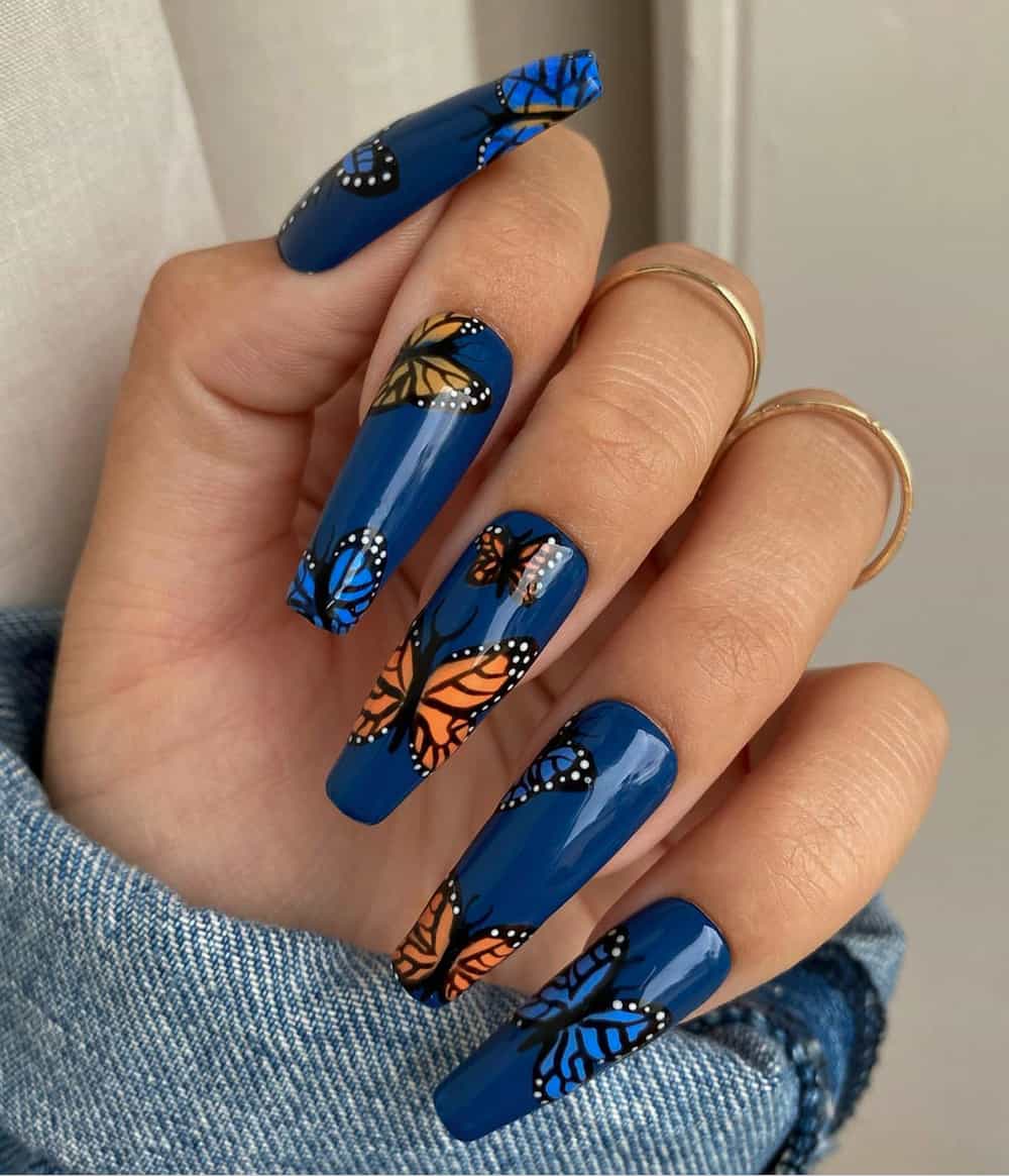 and with dark blue nails with Butterly art