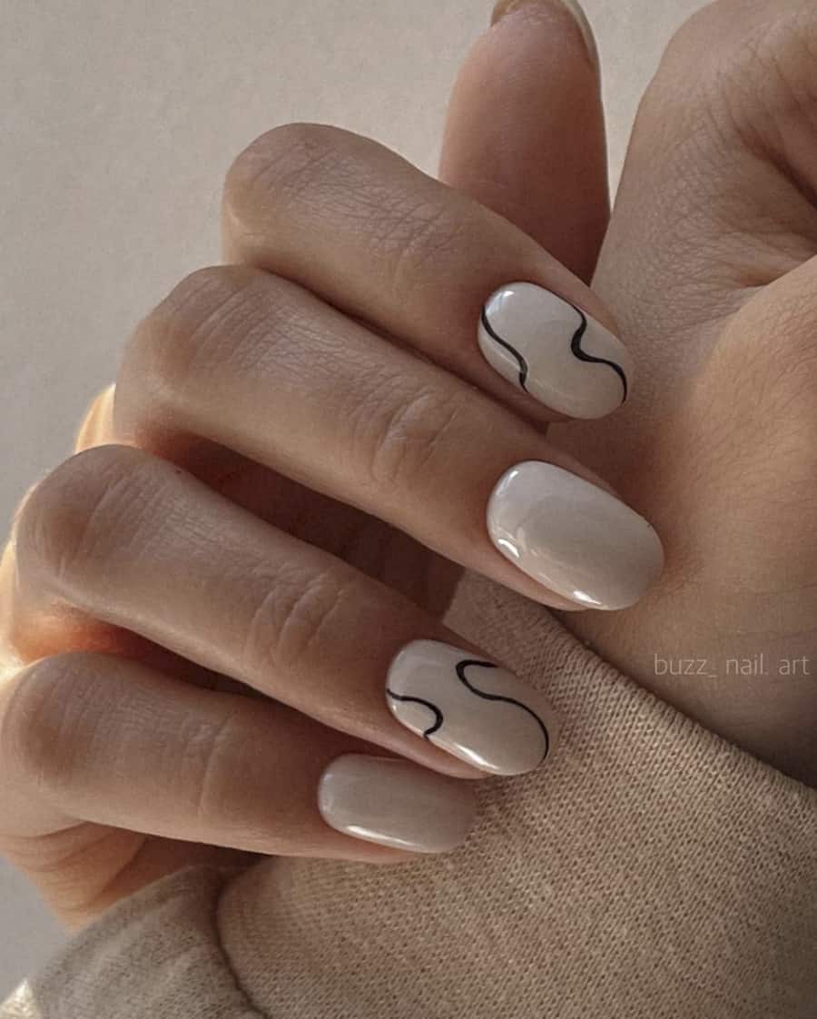 image of a hand with light taupe neutral nails and a wavy black line accent