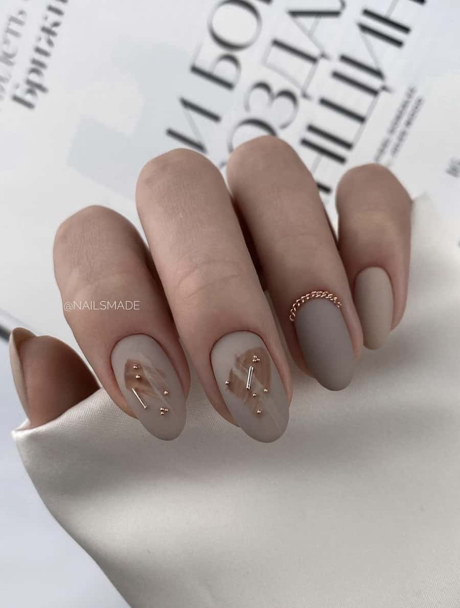 image of Neutral Almond Nails with Bead Accents