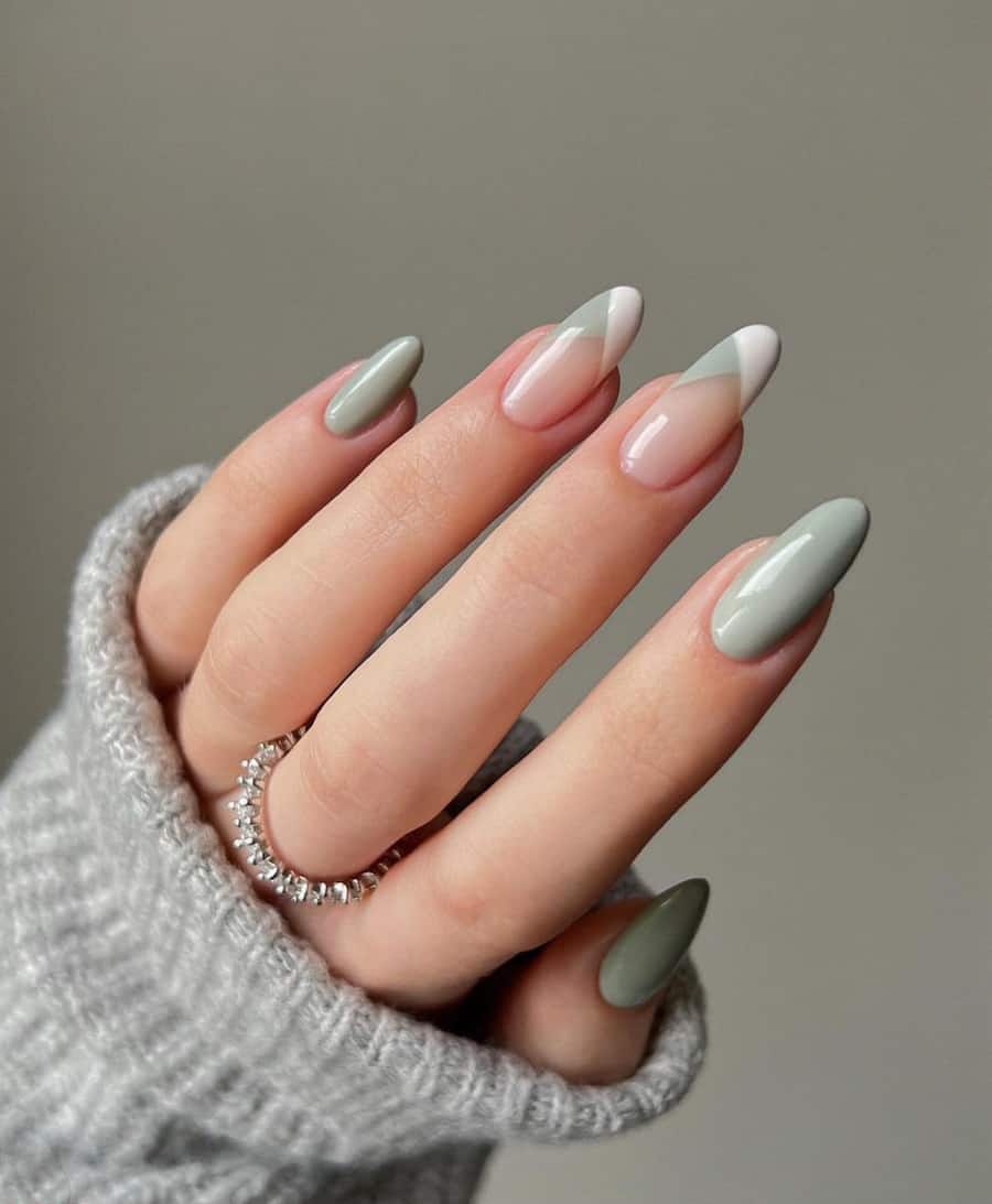 hand with sage green and neutral nail art