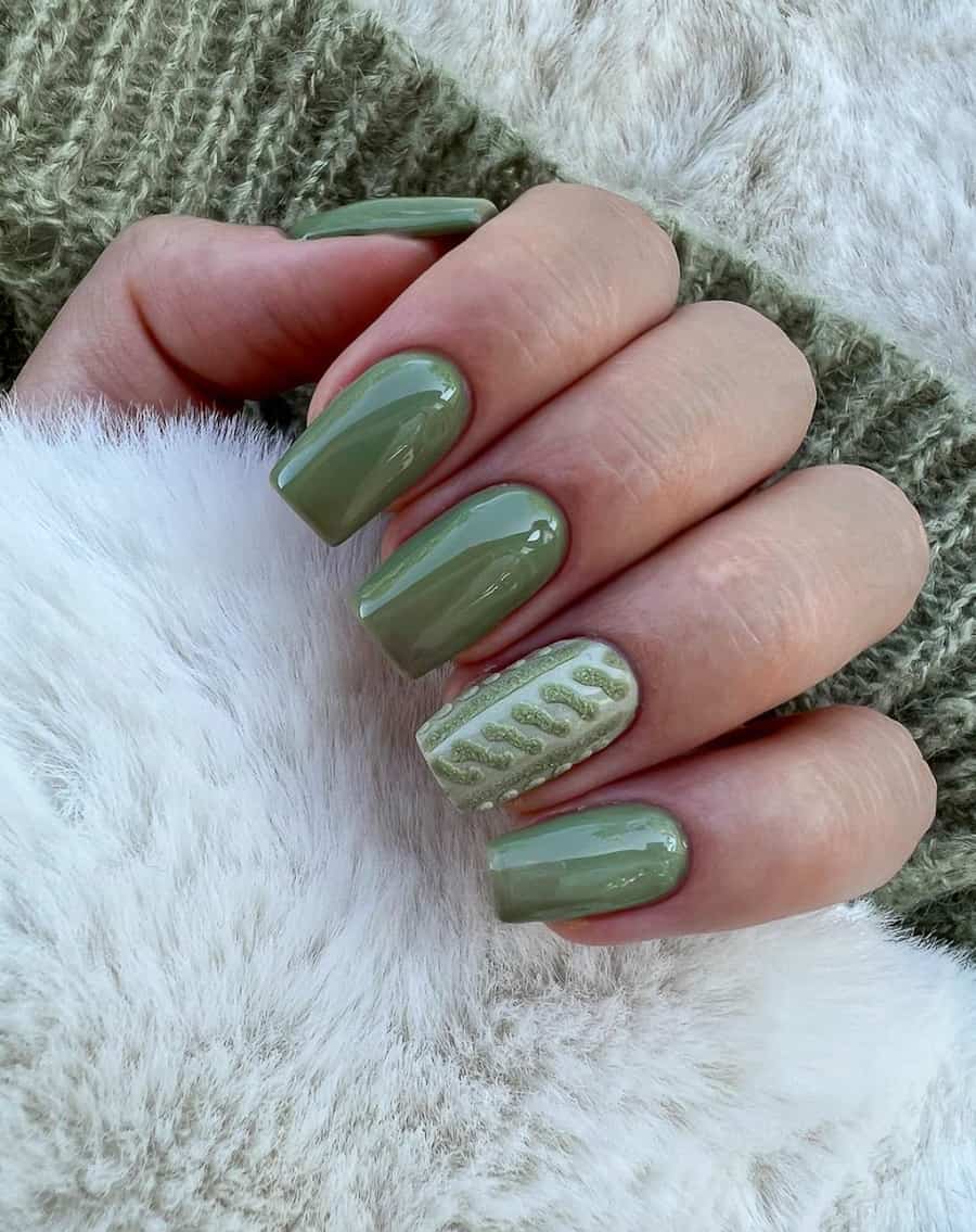 hand with short coffin nails with olive green coloring