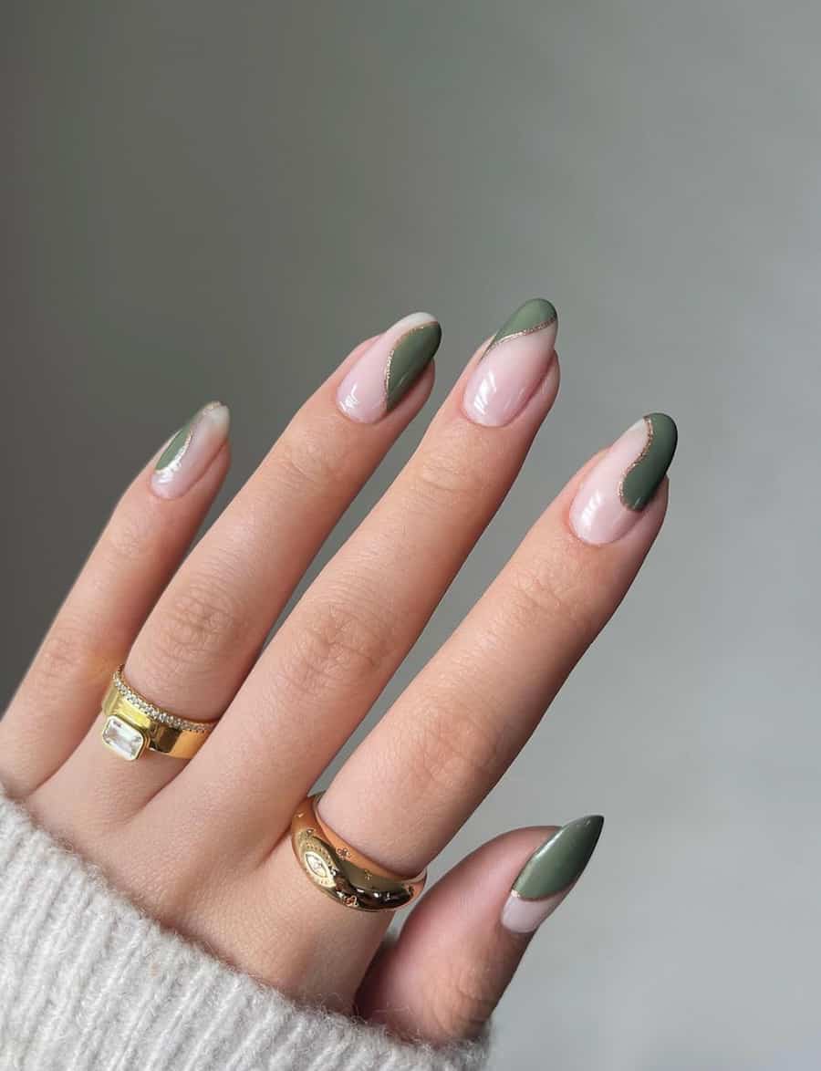 hand with nails that have nude and olive green accents