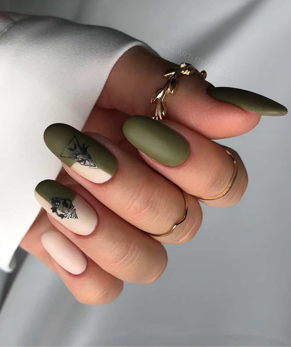 hand with long almond nails painted in matte olive green with neutral accents