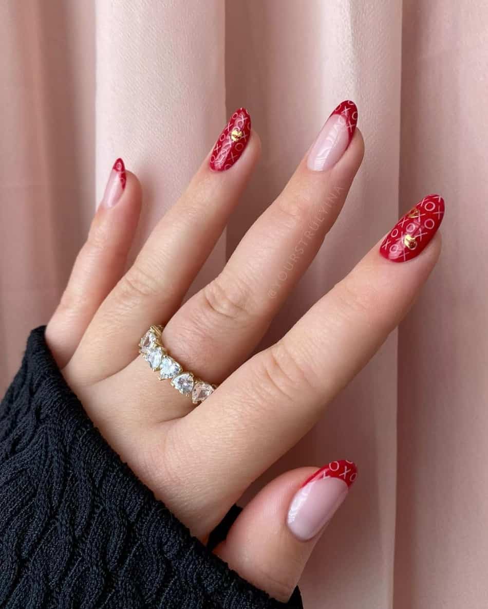 hand with pink and dark red nails with love text designs