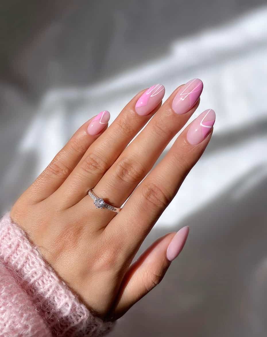 image of a hand with light pink nails with white wavy lines