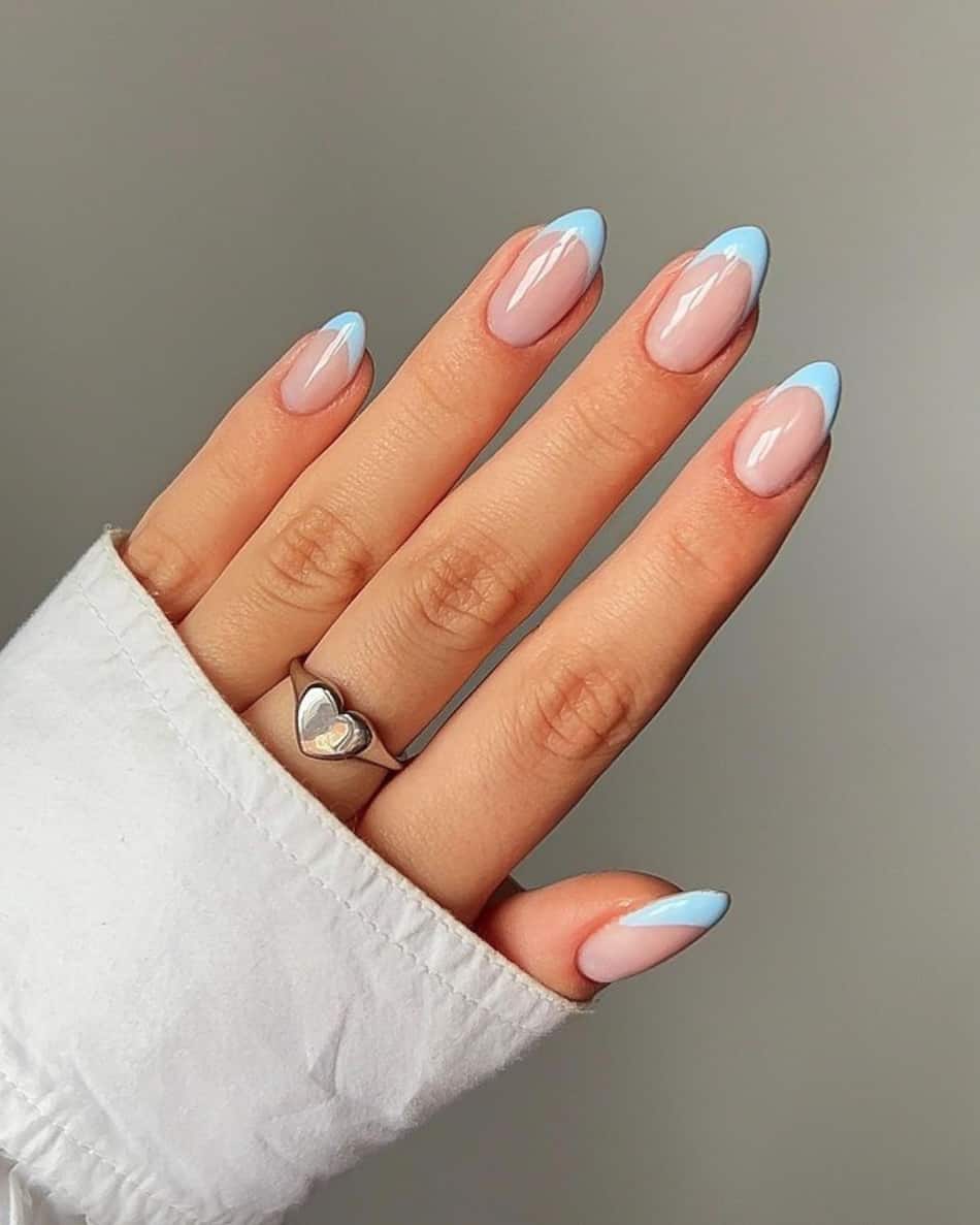 French manicure with light blue tips. 