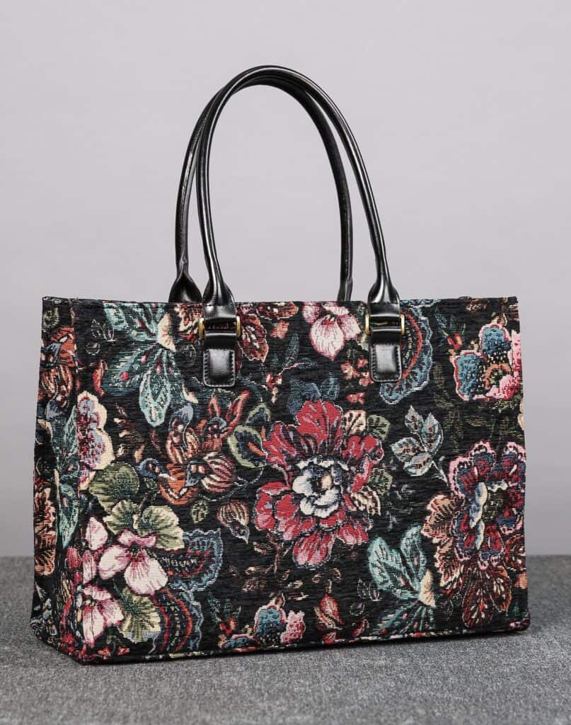 image of a beautiful book tote with a black floral tapestry design that is inspired by the Dior Book Tote