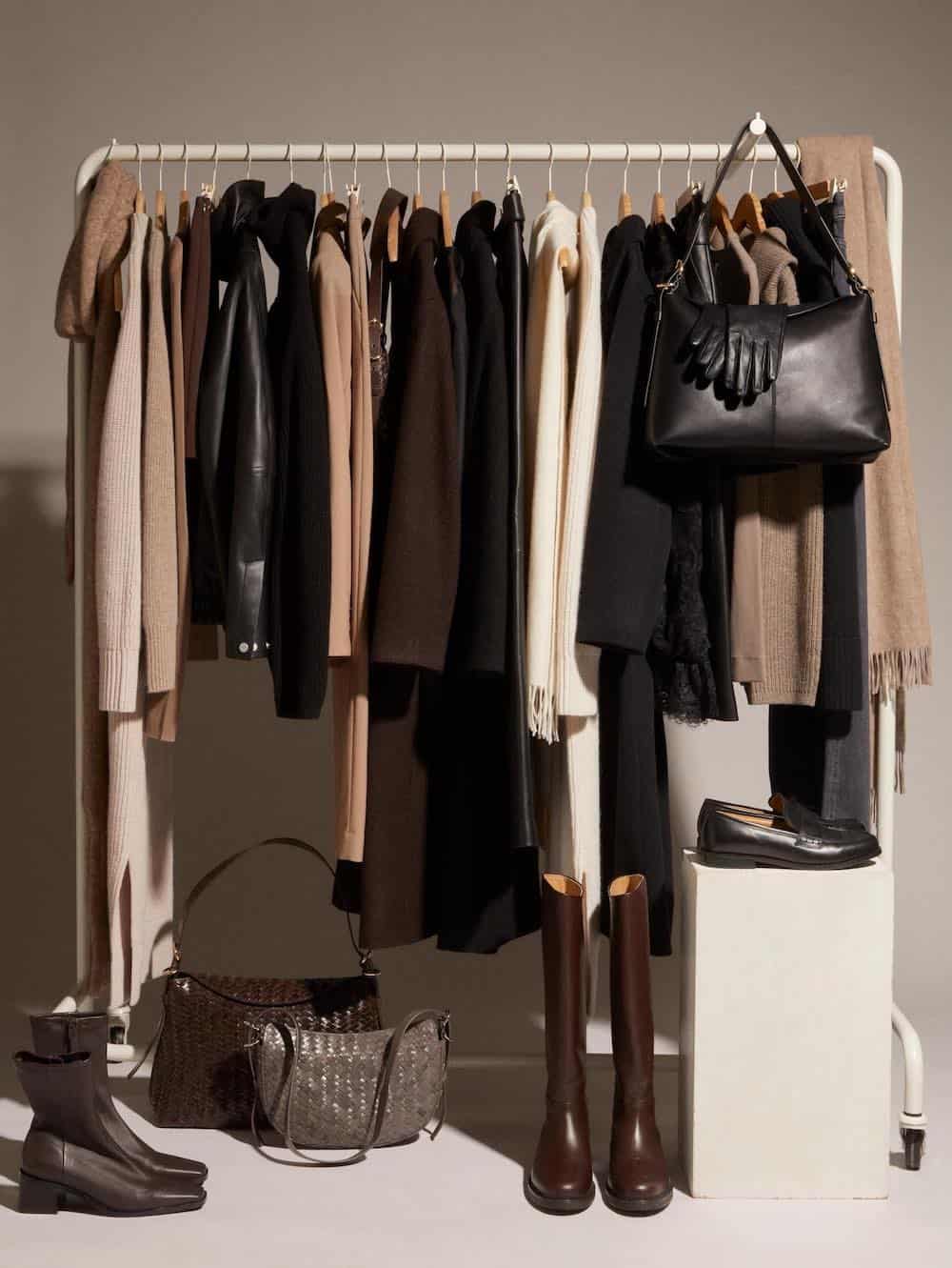image of a clothing rack with capsule wardrobe items from & Other Stories in neutral colors
