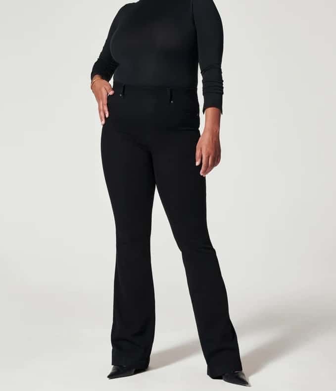 An image of black flare leg jeans from Spanx