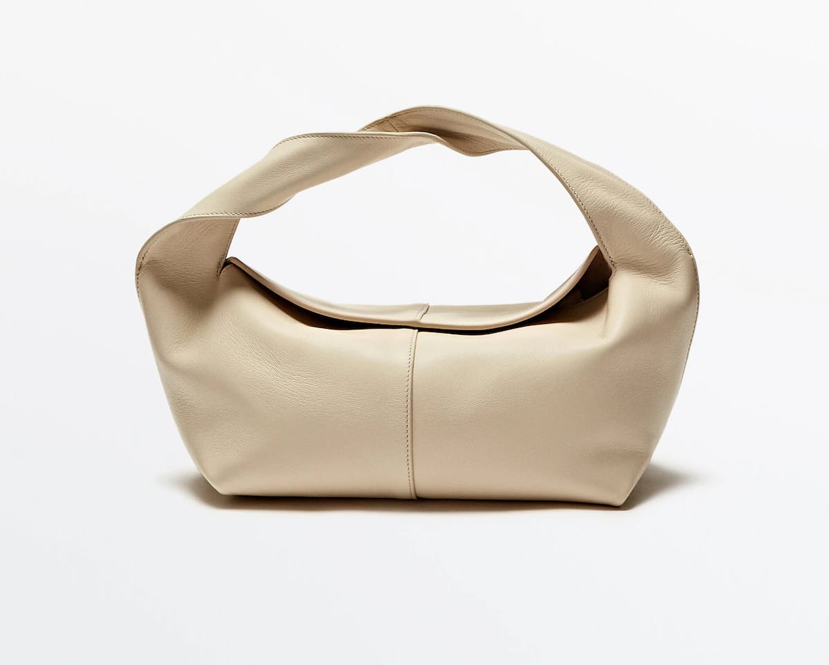 image of a cream hobo bag that looks like the Khaite olivia bag