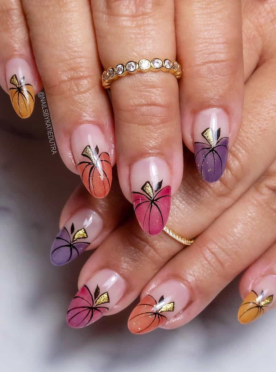 a hand with glossy natural nude almond nails with orange, pink, purple, and yellow pumpkin French tips with gold stems