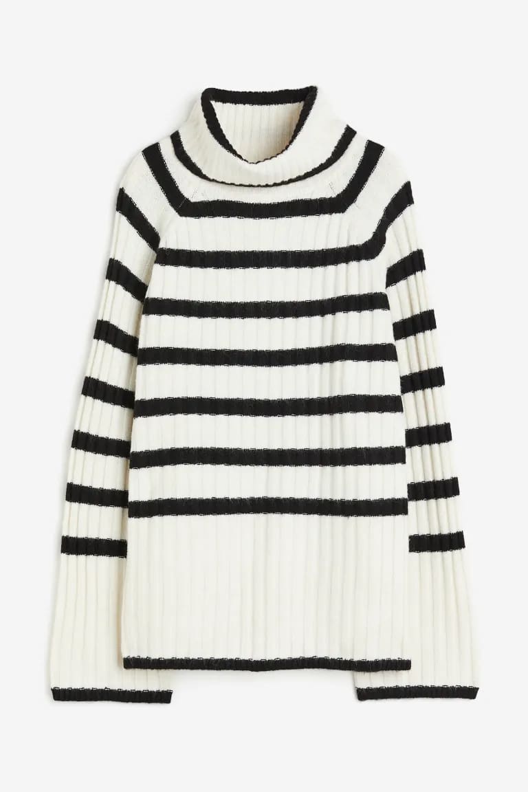 image of a white and black striped turtleneck sweater that is a lookalike of the Toteme sweater