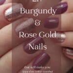 hand with Burgundy and rose gold nails