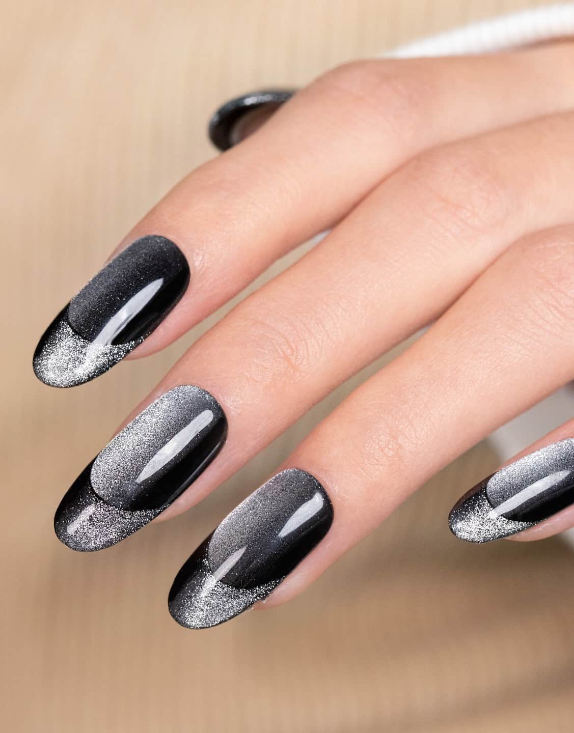 Long black shimmering nails with French tips