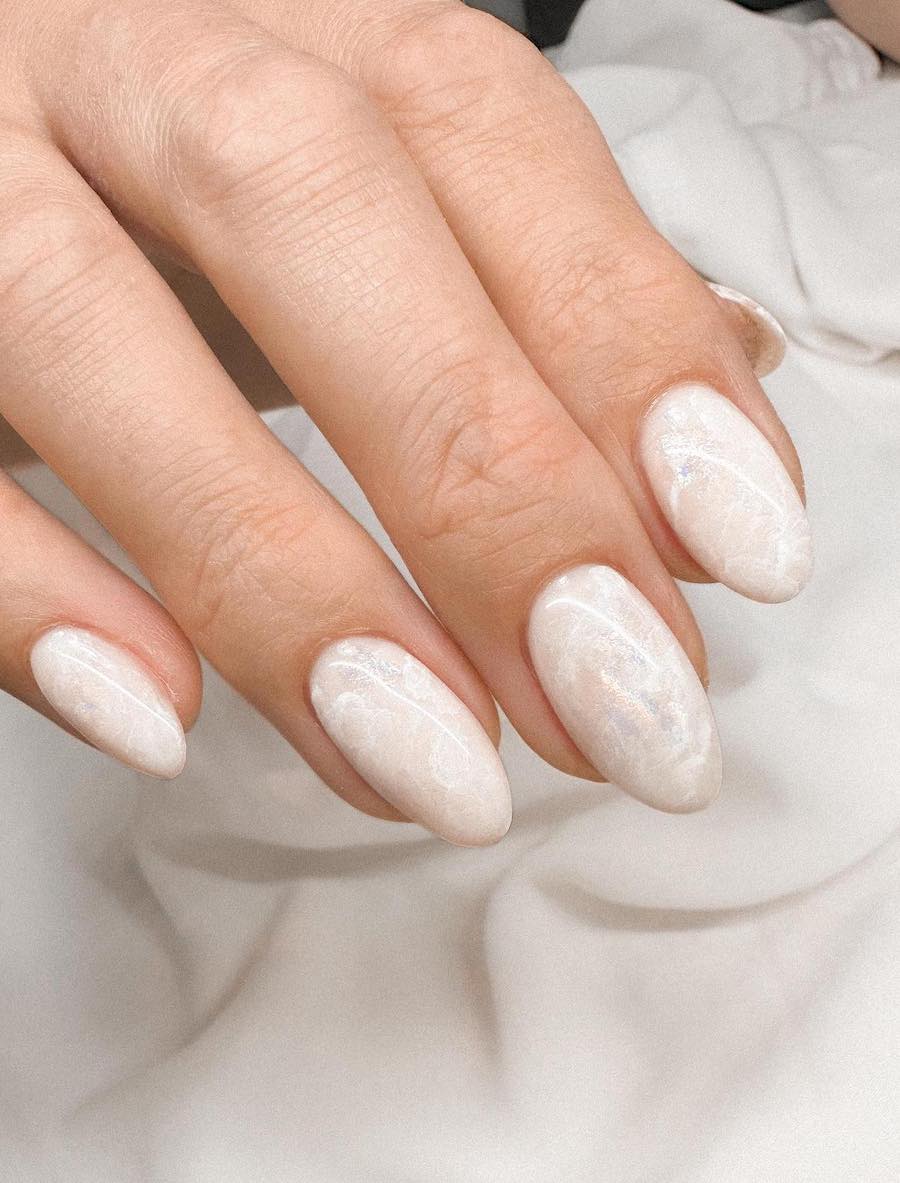 Short white marbled almond nails