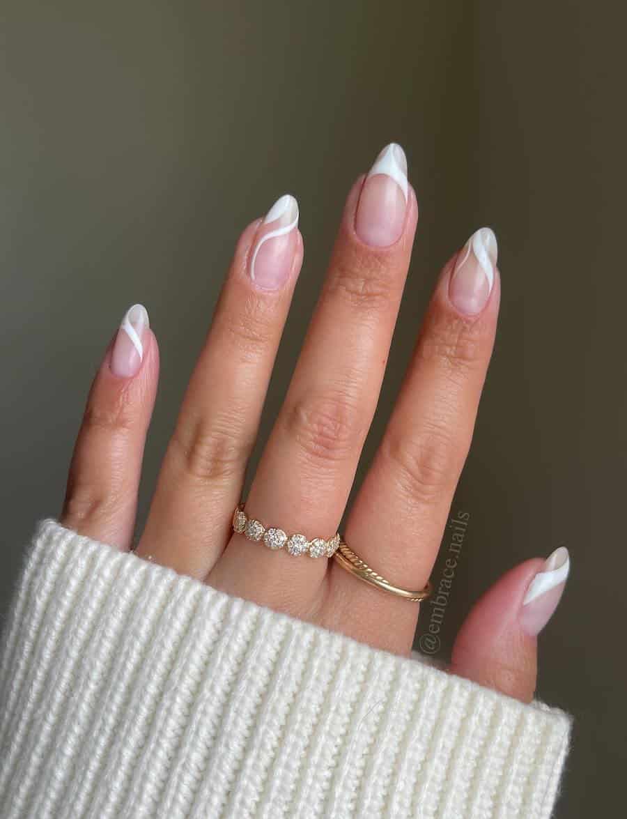 Short almond nails with white wave accents