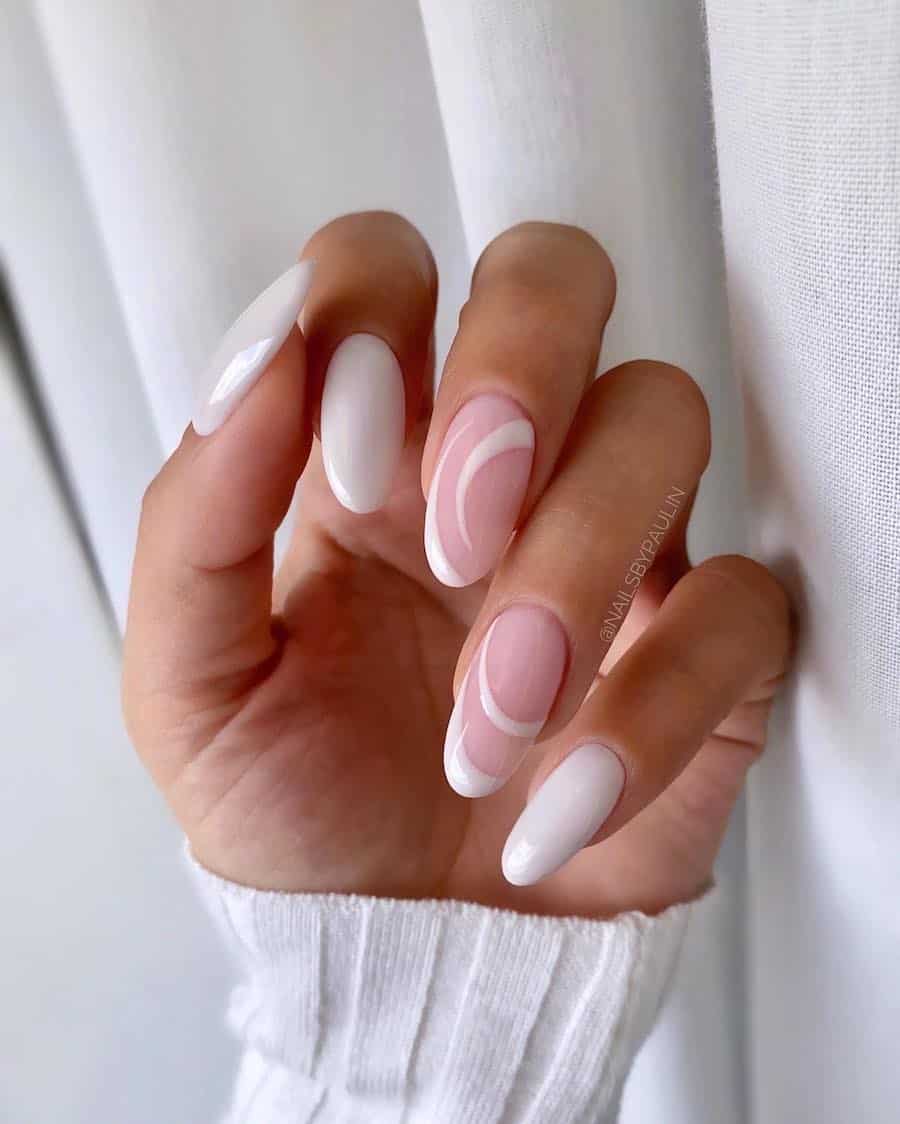 Long almond nails with pink nude accent nails with white line details