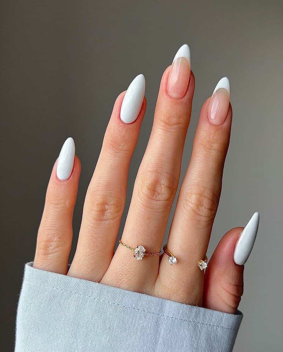 Long white almond nails with French tip accent nails