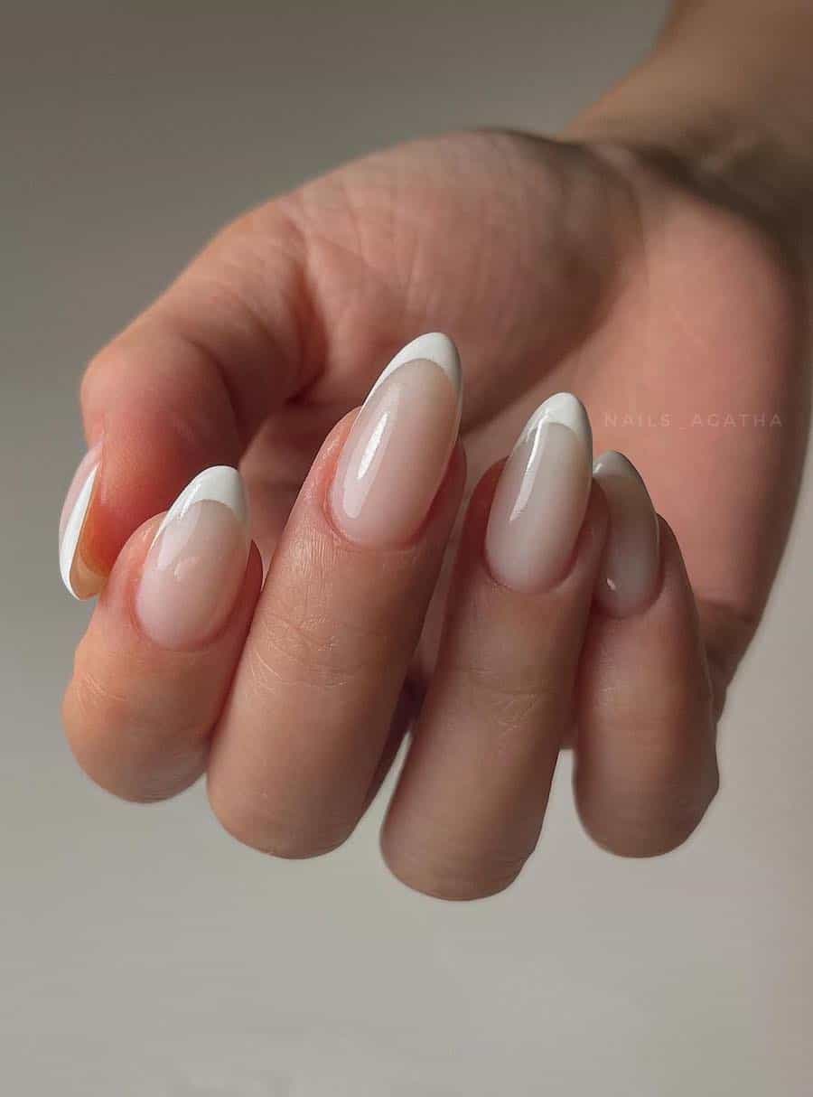 Medium length almond nails with white French tips