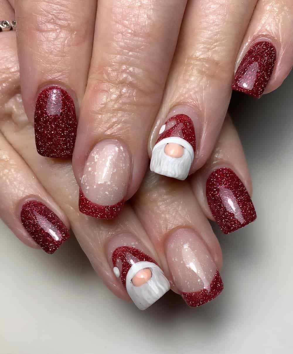 Red glitter french manicure with Santa detail accent nails.