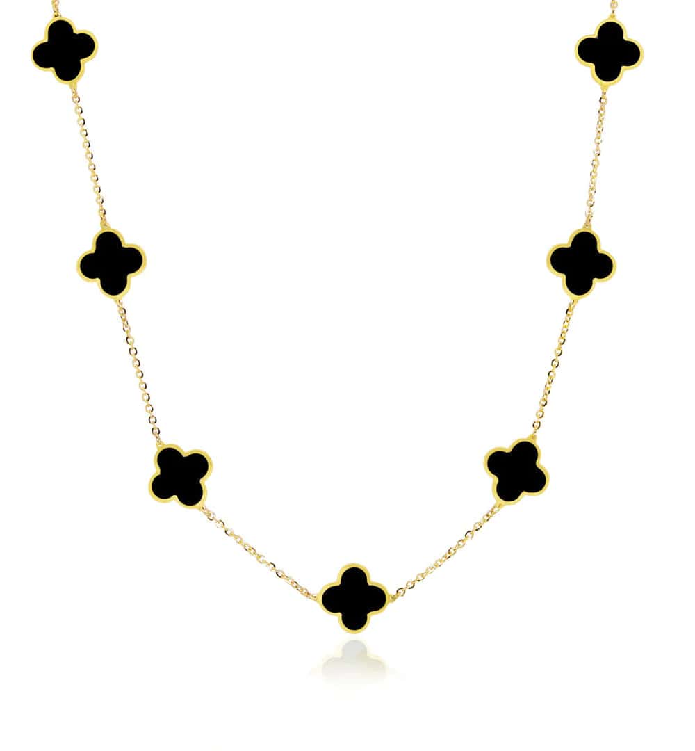 An image board of a large Van Cleef necklace dupe from Lovery in black and gold