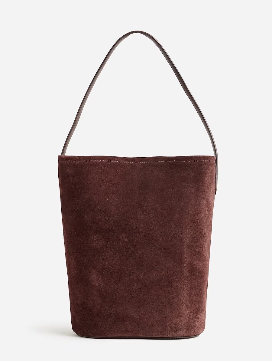 A brown suede The Row tote bag dupe from J. Crew