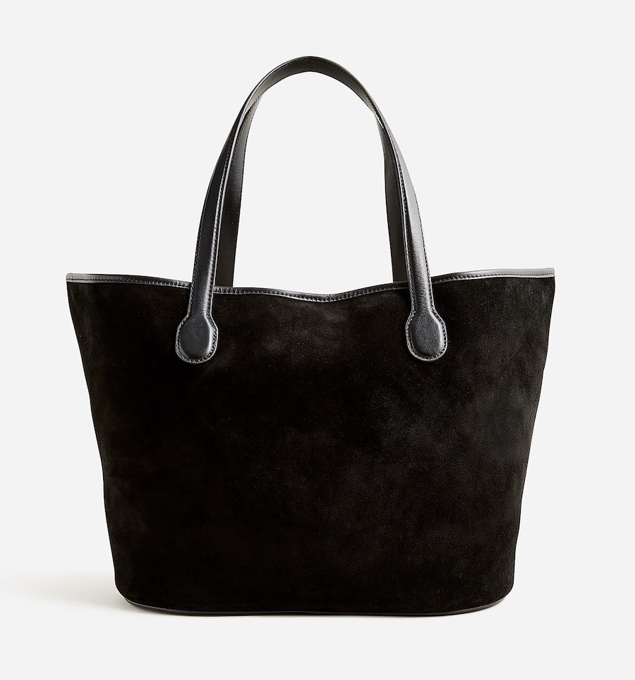 A black suede The Row Idaho bag dupe from J. Crew
