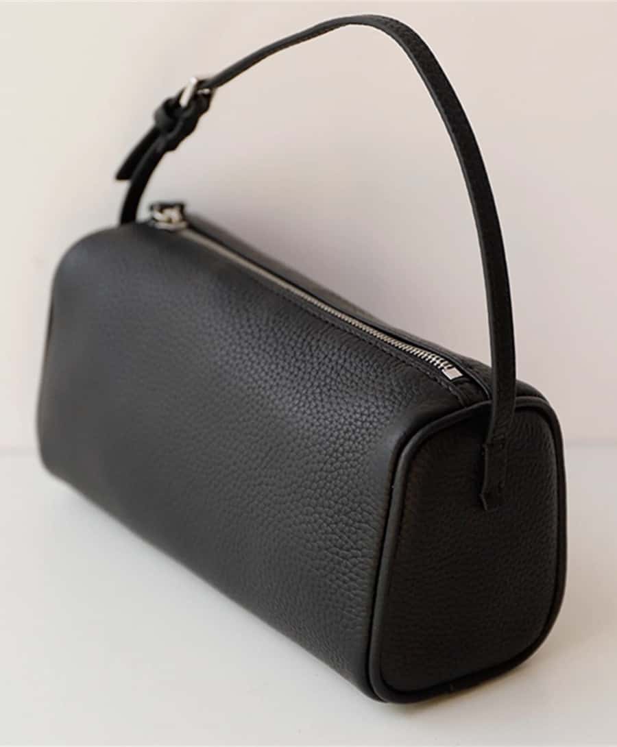A black leather The Row 90s bag dupe from Etsy