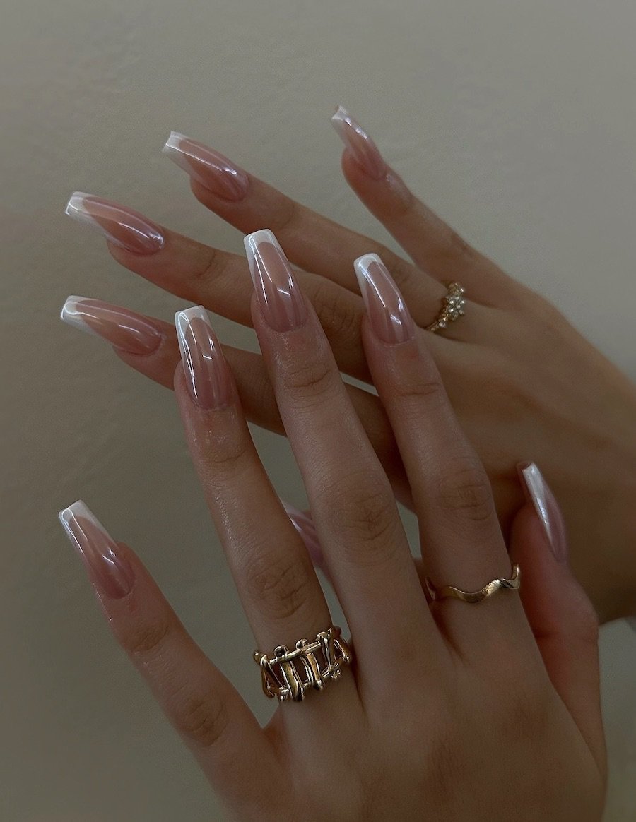 Long coffin nails with a classic French manicure and a chrome finish